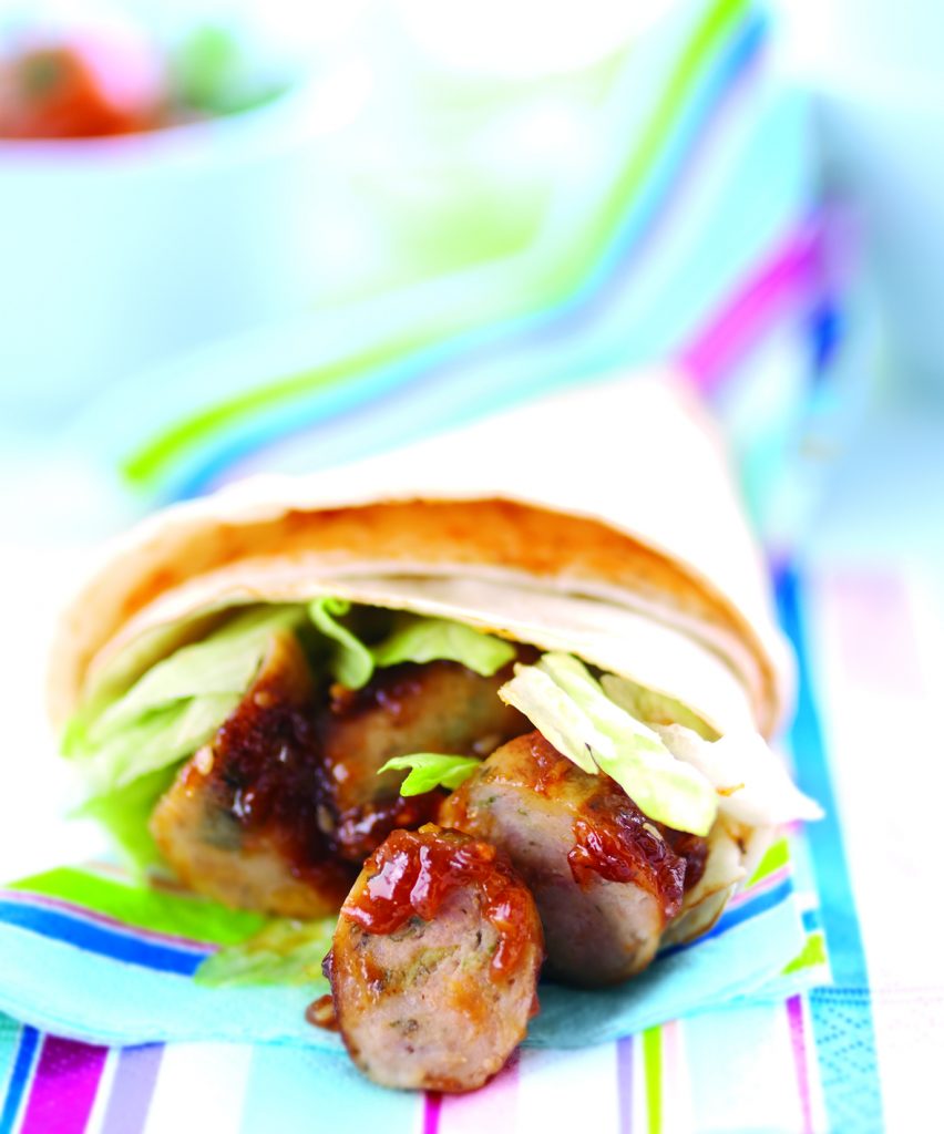 Sticky sausage in 10" Tortilla wrap. Available from MKG Foods, your foodservice partner in the Midlands.