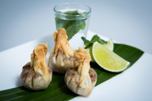 Mojito Pulled Pork Wonton. Available from MKG Foods - Your Foodservice Partner in the Midlands.