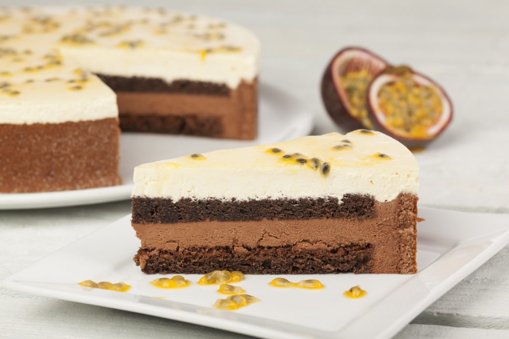 C23068 - Belgian Chocolate & Passion Fruit Delice. Available from MKG Foods, your foodservice partner in the Midlands.