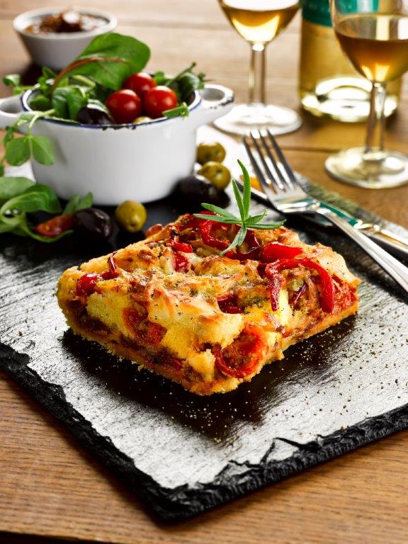 C23248 Roasted Tomato Roquito Pepper Mozzarella Green Sunflower Seed & Basil Traybake. Available from MKG Foods, your foodservice partner in the Midlands.