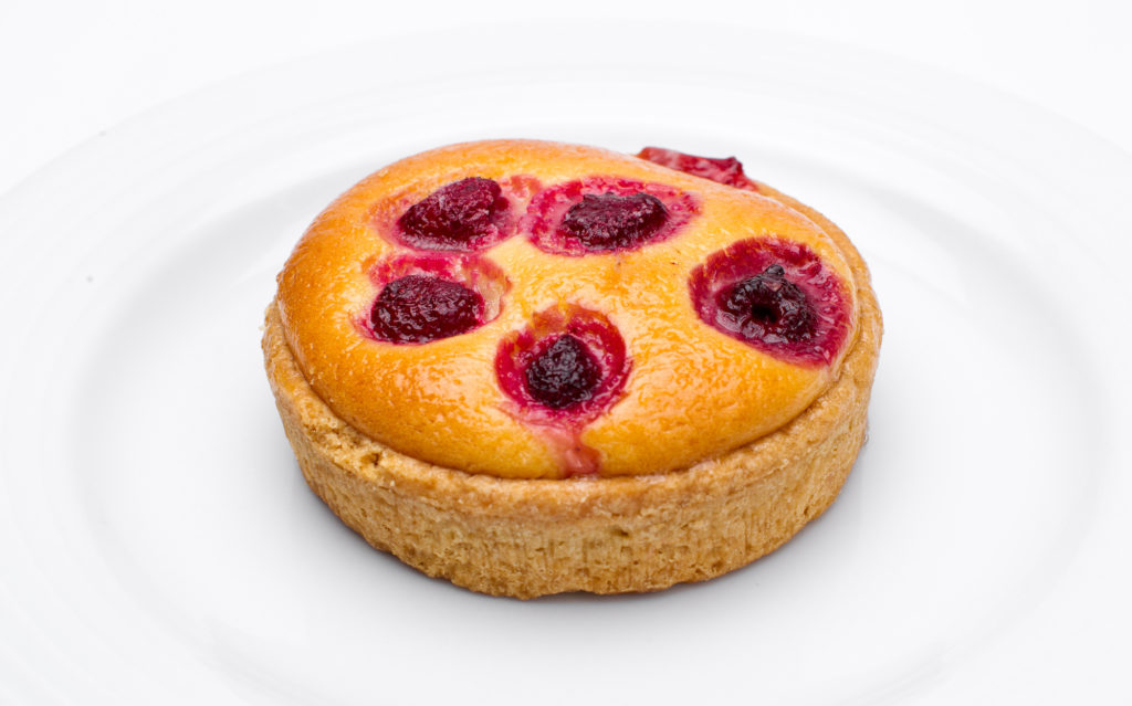 C24187 - Individual Raspberry & White Chocolate Frangipan. Available from MKG Foods, your foodservice partner in the Midlands.