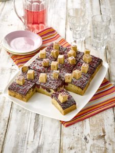 Vegan Chocolate, Raspberry & Coconut Slice. Available from MKG Foods, your foodservice partner in the Midlands.