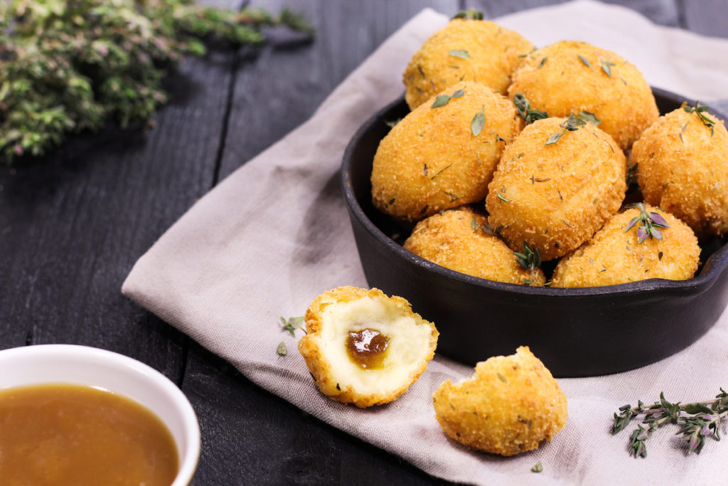 C18230 - Mash 'n' Gravy Bites. Available from MKG Foods, your foodservice partner in the Midlands.