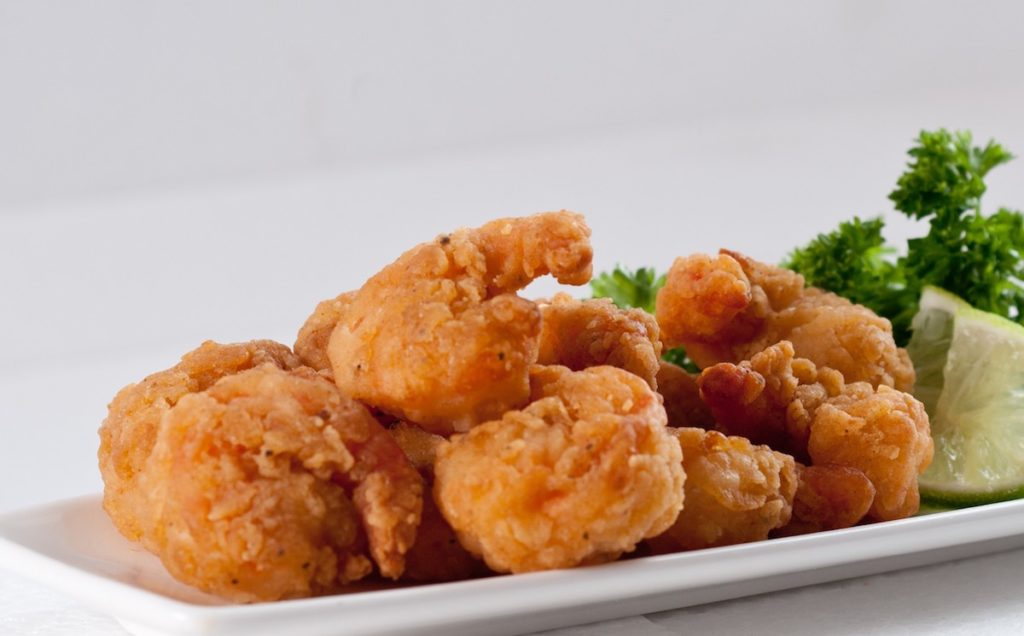 C10402 - Fiery Popcorn Shrimp. Available from MKG Foods, your foodservice partner in the Midlands.