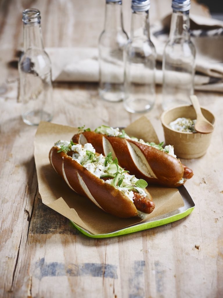 C15527 - Laugen hot dog roll. Available from MKG Foods, your foodservice partner in the Midlands.