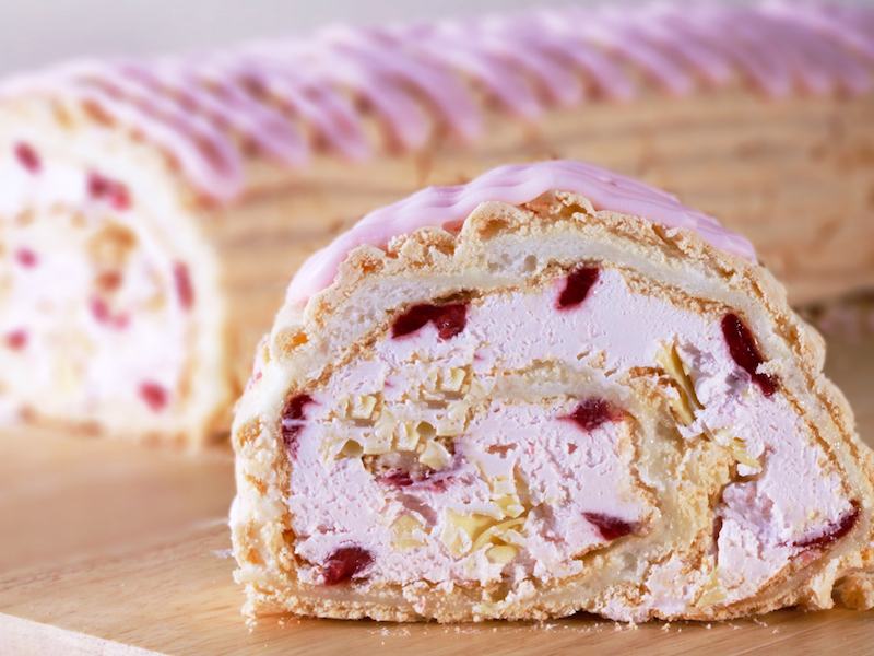 C23340 - Gluten Free Raspberry & White Chocolate Roulade (whole). Available from MKG Foods, your foodservice partner in the Midlands.