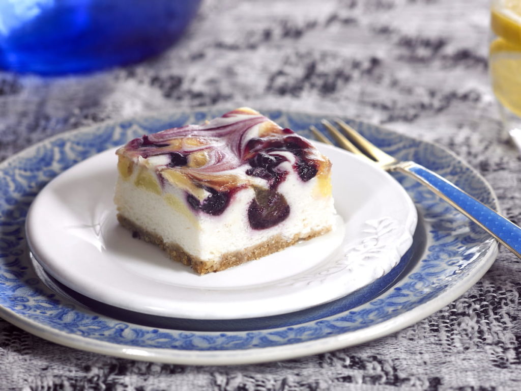 C17034 - Vegan Lemon & Blueberry Cheesecake. Available from MKG Foods, your foodservice partner in the Midlands.