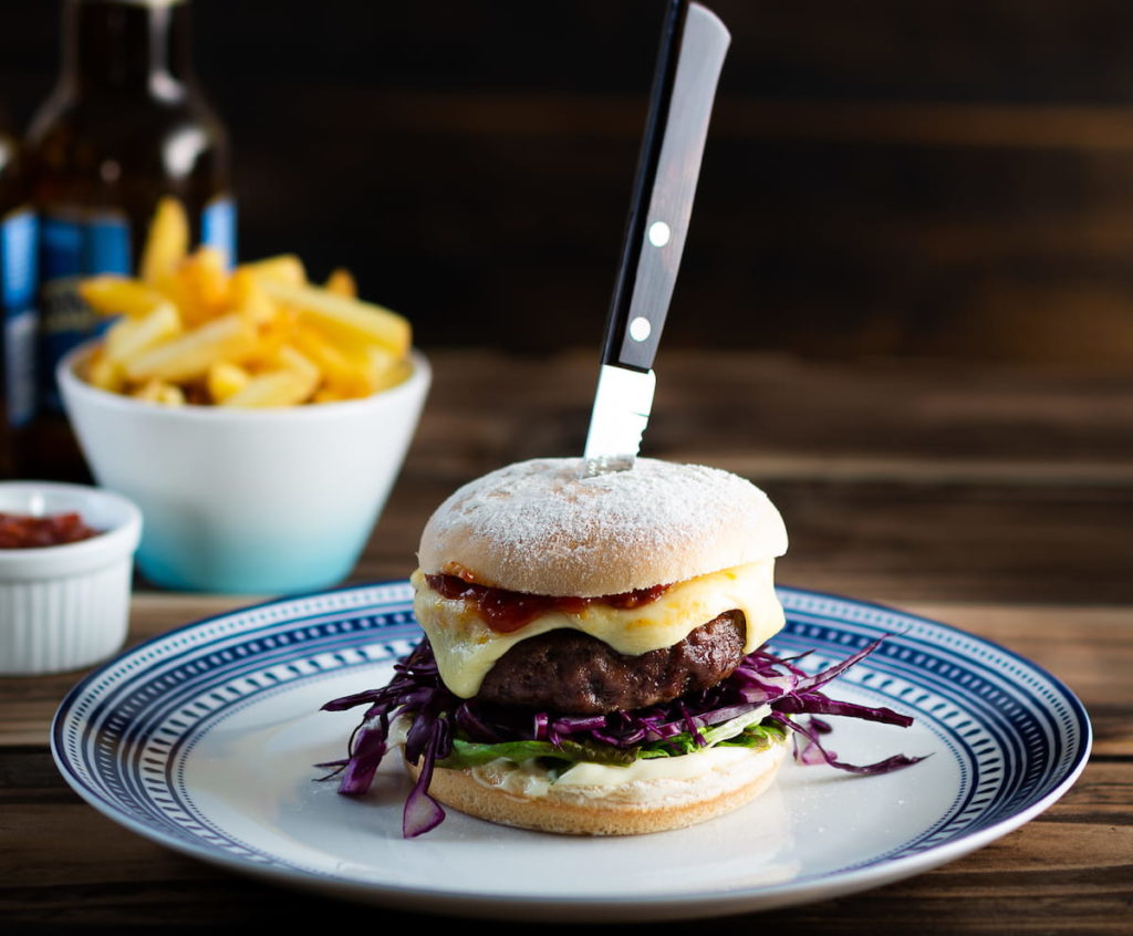 C19483 - Sourdough Burger Bap. Available from MKG Foods, your foodservice partner in the Midlands.