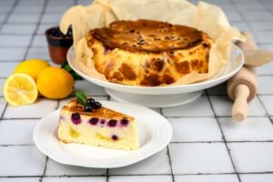 C16984 - Blackcurrant & Lemon Basque Cheesecake. Available from MKG Foods, your foodservice partner.