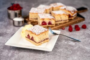 C16987 - Raspberry coconut frangipane square. Available from MKG Foods, your foodservice partner.
