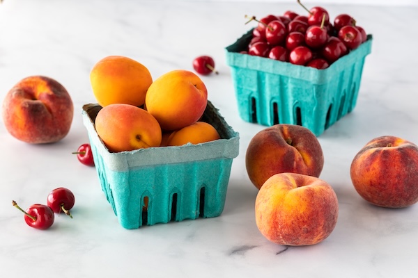 cardboard-containers-of-apricots-and-cherries